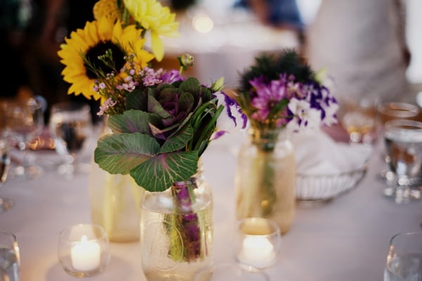 Sunflower wedding table flowers - Picture by Judy Pak Photography