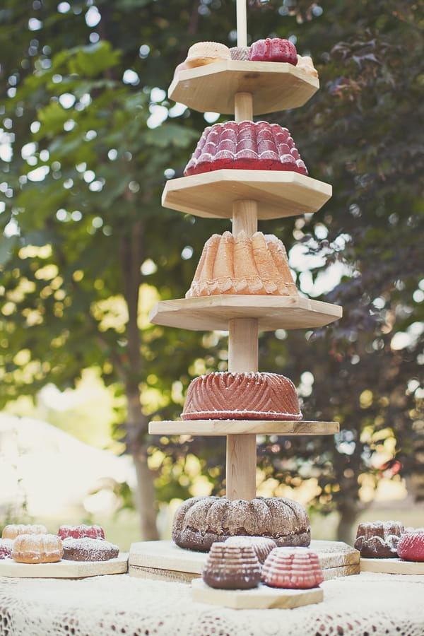 Cake stand at wedding reception - Picture by Our Labor of Love Photography