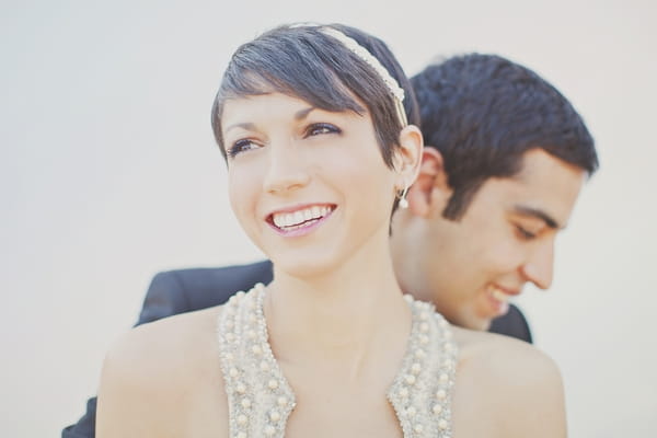 Bride and groom smiling - Picture by Our Labor of Love Photography