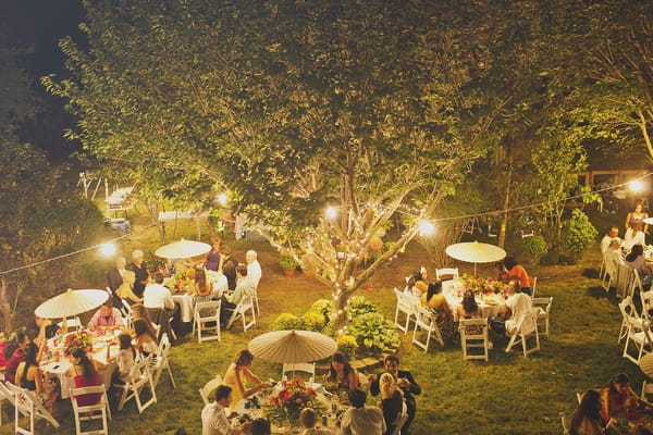 Garden wedding reception at night - Picture by Our Labor of Love Photography