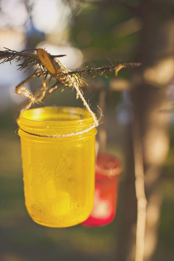 Yellow jar hanging from tree - Picture by Our Labor of Love Photography