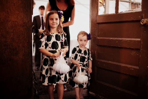 Flower girls leading bride into wedding - Picture by Judy Pak Photography