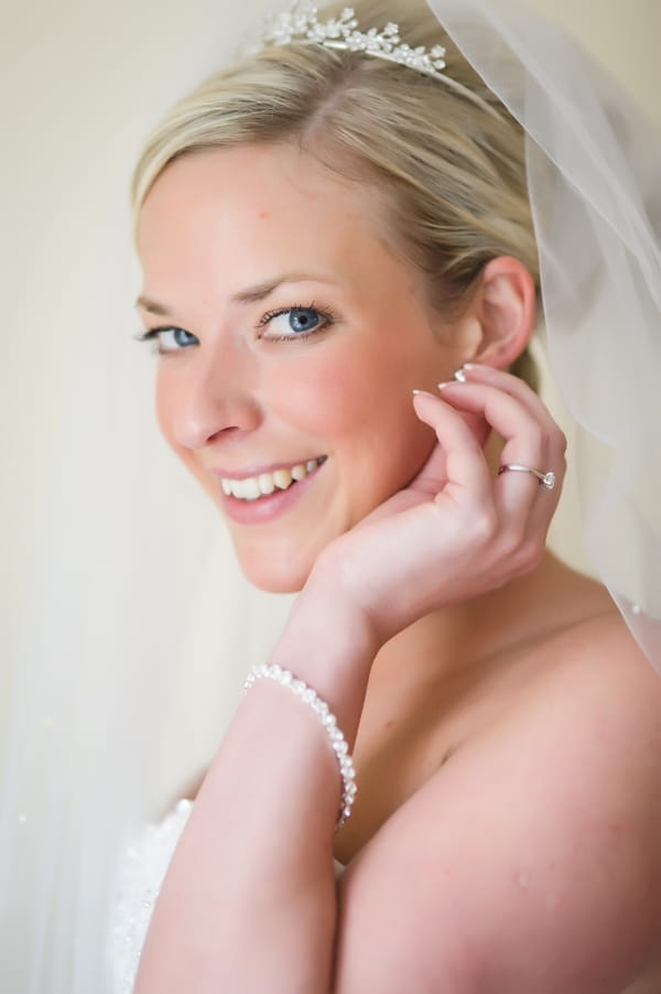 Bride touching her ear - Picture by Pixies in the Cellar