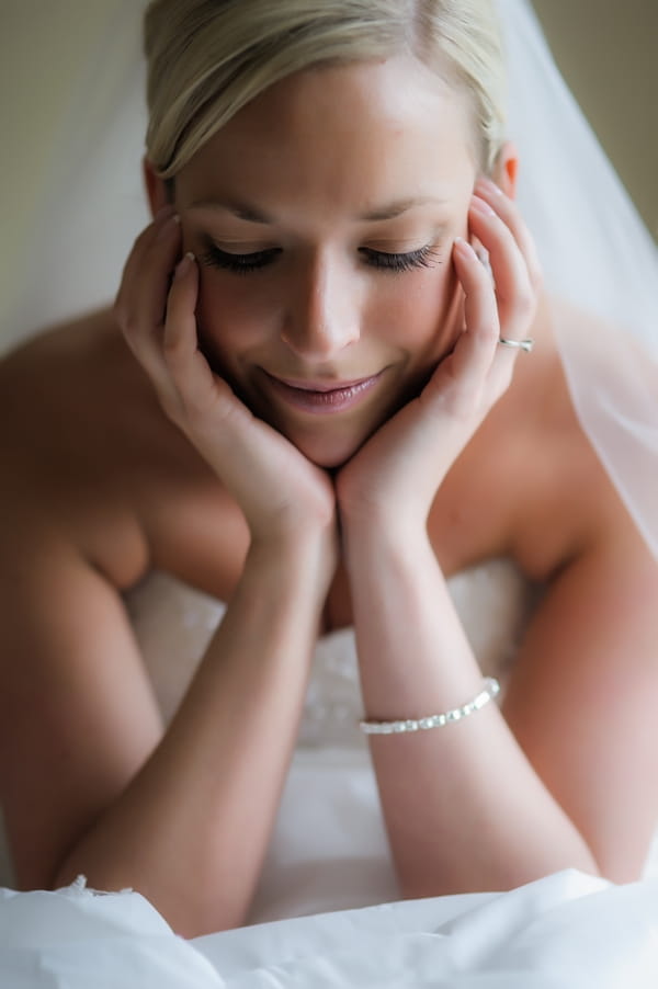 Bride resting her head in her hands - Picture by Pixies in the Cellar