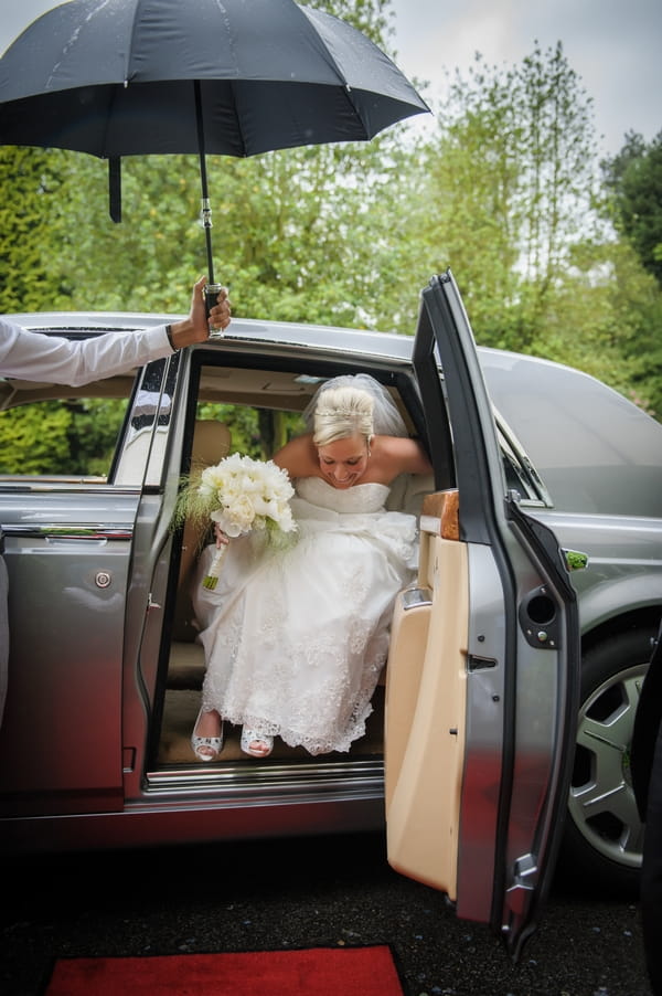 Bride getting out of Rolls Royce Phantom wedding car - Picture by Pixies in the Cellar