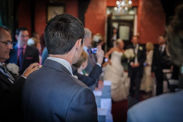 Groom watching bride walk down the aisle - Picture by Pixies in the Cellar