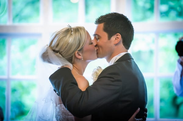 Bride and groom first kiss - Picture by Pixies in the Cellar