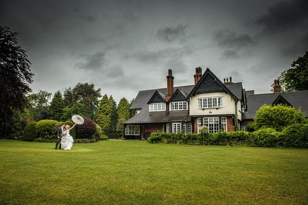 Bride and groom in grounds of Mere Court - Picture by Pixies in the Cellar