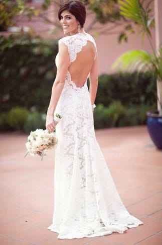 Bride wearing open back wedding dress - Picture by Joielala