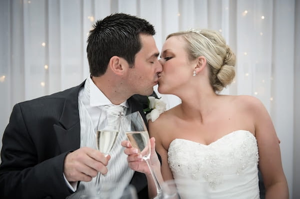 Bride and groom kissing - Picture by Pixies in the Cellar