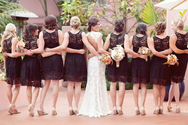 Bride with bridesmaids wearing black dresses - Picture by Joielala