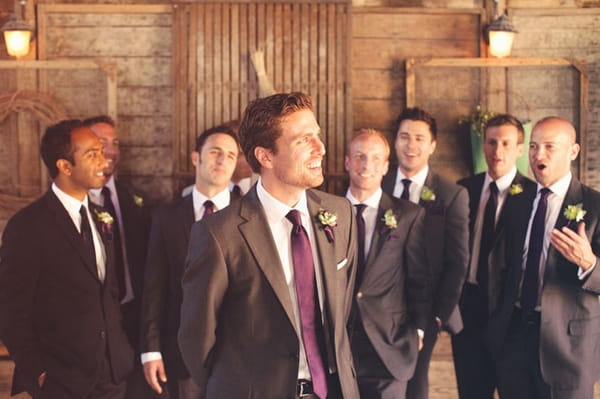 Groom and groomsmen in barn - Picture by Kate Harrison Photography