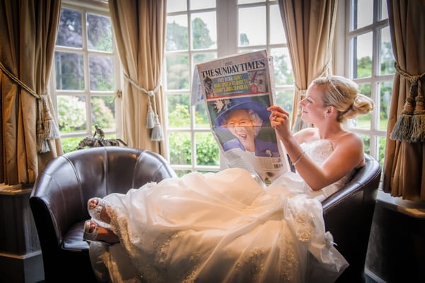 Bride reading a newspaper - Picture by Pixies in the Cellar