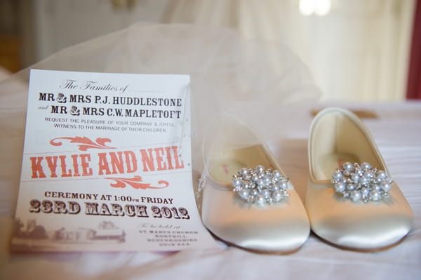 Wedding invitation and wedding shoes - Picture by Gareth Squance Photography