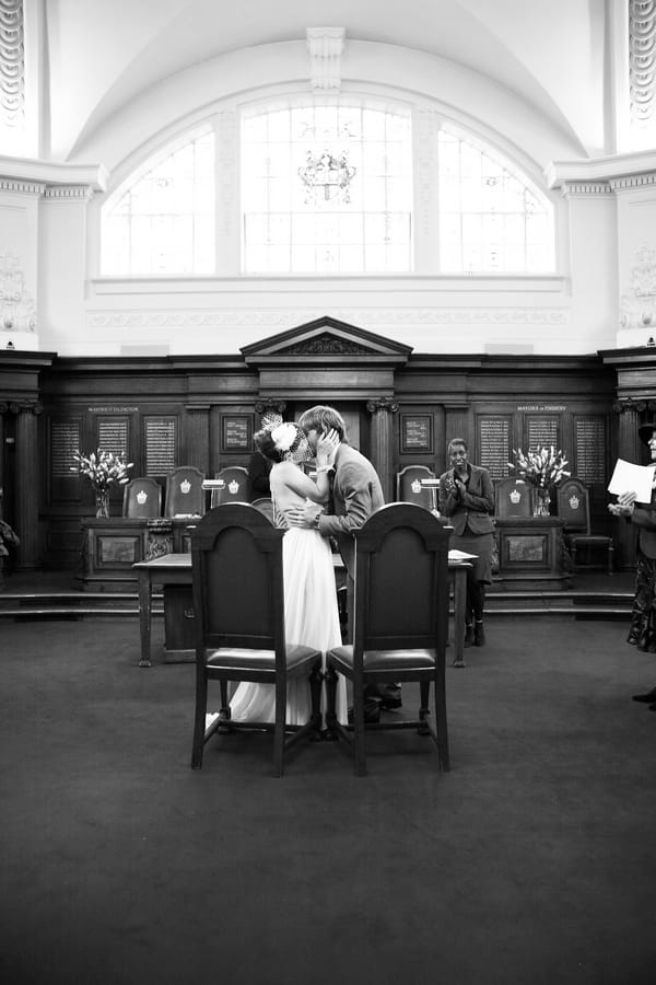 Bride and groom kiss at altar - Picture by Rebecca Prigmore Photography