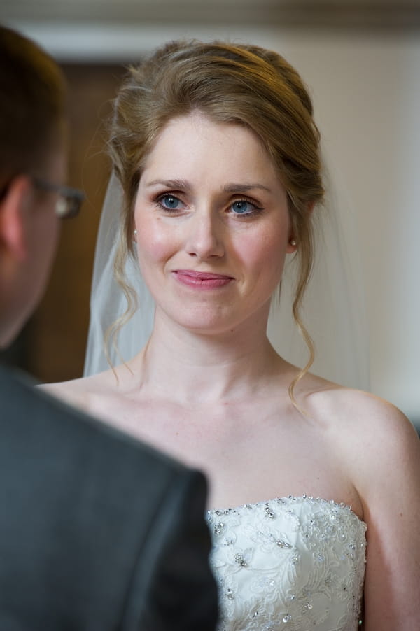 Bride looking at groom - Picture by Gareth Squance Photography