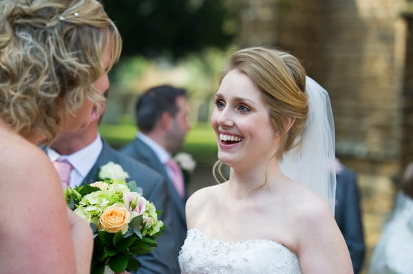 Bride talking to wedding guests - Picture by Gareth Squance Photography