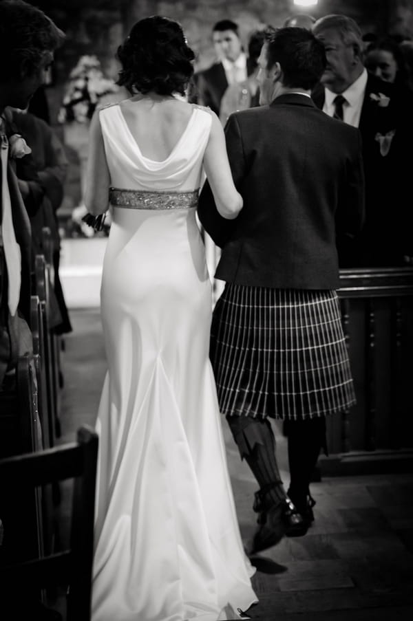 Bride and groom leaving wedding ceremony - Picture by Jonathan Bean Photography