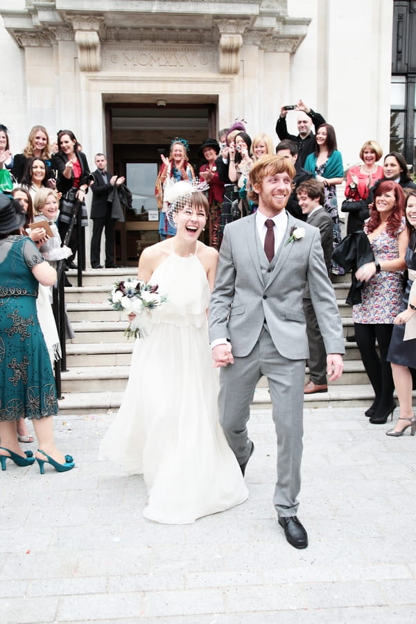 Newly married bride and groom leave wedding ceremony at Islington Town Hall - Picture by Rebecca Prigmore Photography