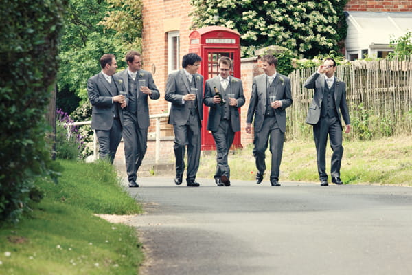 Groom and groomsmen walking to wedding - A Homemade Marquee Wedding