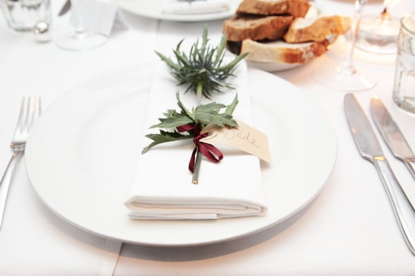 Thistle on wedding table setting - Picture by Rebecca Prigmore Photography