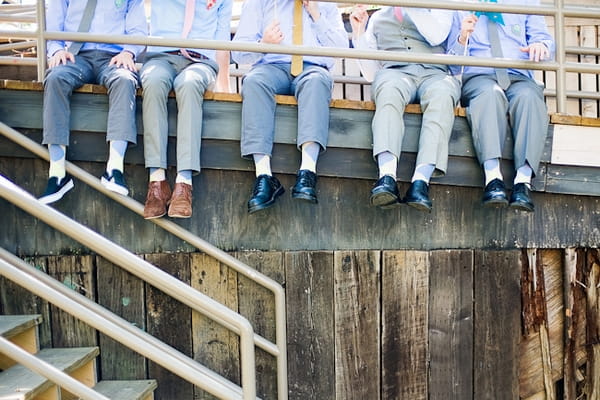 Groomsmen's legs hanging over edge - A Fun, Fun, Fun Wedding