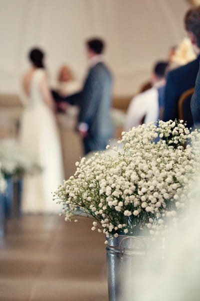 Gypsophelia wedding flowers in church - A Homemade Marquee Wedding