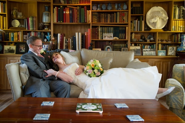 Bride and groom on sofa - Picture by Gareth Squance Photography