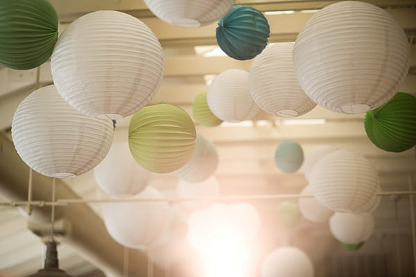 White and green lanterns on ceiling of wedding - A Fun, Fun, Fun Wedding