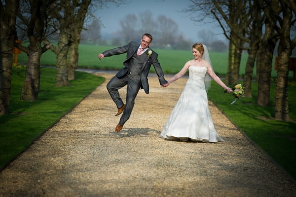 Groom jumping - Picture by Gareth Squance Photography