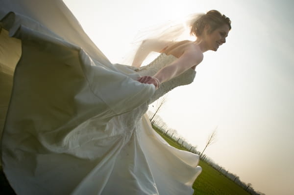 Bride twirling in wedding dress - Picture by Gareth Squance Photography