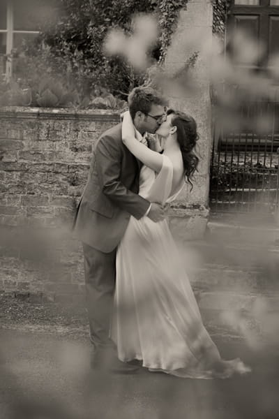 Bride and groom kissing - A Homemade Marquee Wedding