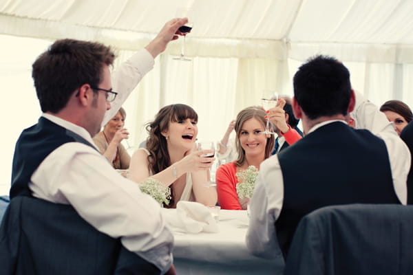 Bride laughing - A Homemade Marquee Wedding