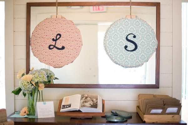 L and S signs over wedding guest book - A Fun, Fun, Fun Wedding