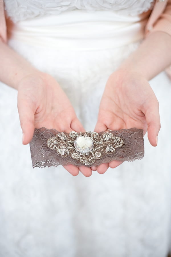 Bride holding garter - A Fun, Fun, Fun Wedding