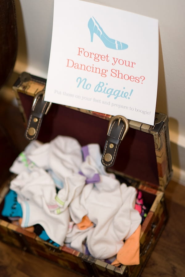 Box of socks for guests to dance in at wedding - A Fun, Fun, Fun Wedding