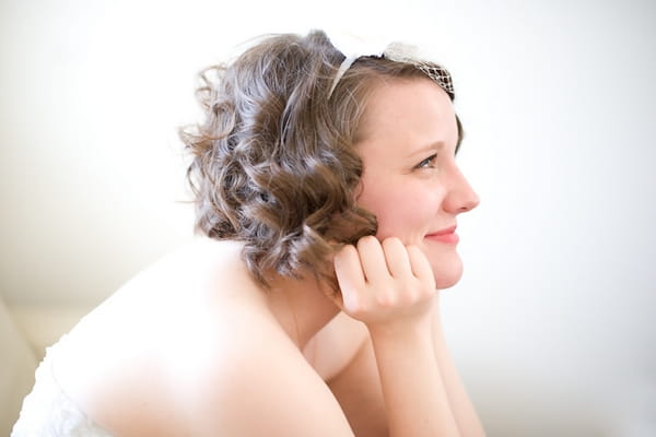 Bride resting chin on her hands - A Fun, Fun, Fun Wedding