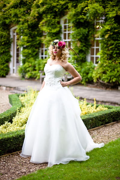 Model wearing wedding dress in garden of Goldney Hall - LoveLuxe Launch