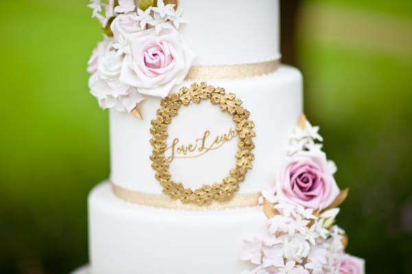 Close up of LoveLuxe written on wedding cake - LoveLuxe Launch