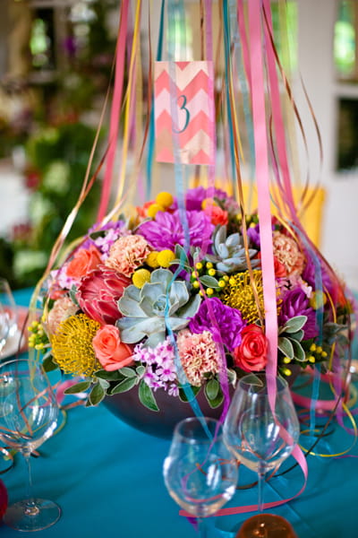 Brightly coloured wedding table flowers - LoveLuxe Launch