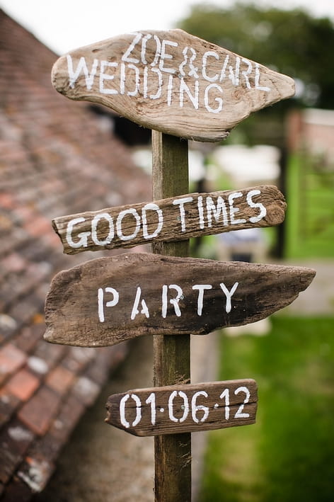 Wooden wedding sign post - A Beautiful Garden Party Wedding at Lains Barn