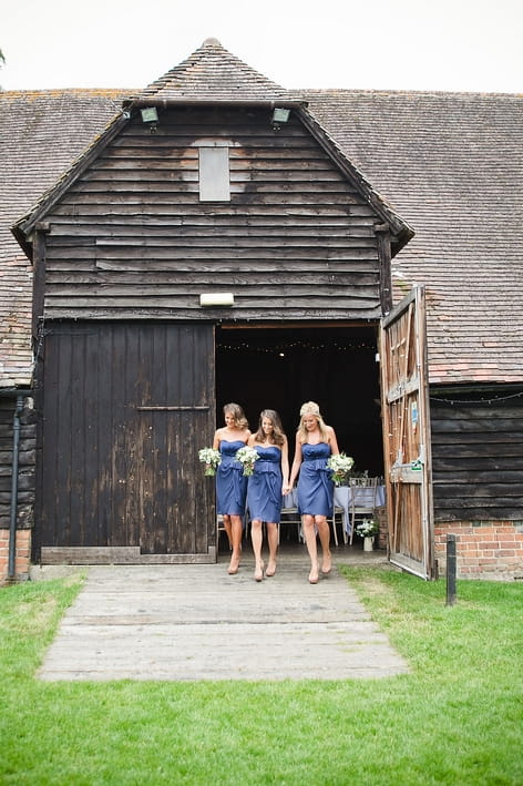 Bridesmaids leaving barn - A Beautiful Garden Party Wedding at Lains Barn