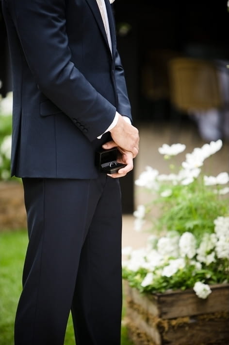 Best man holding rings - A Beautiful Garden Party Wedding at Lains Barn