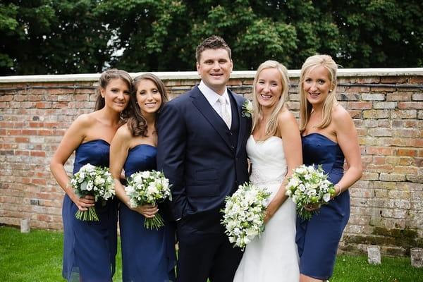 Bride, groom and bridesmaids - A Beautiful Garden Party Wedding at Lains Barn