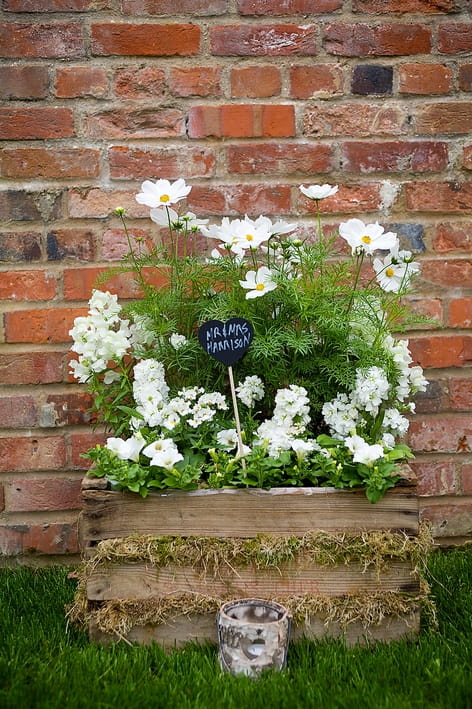 Crate of wedding flowers - A Beautiful Garden Party Wedding at Lains Barn