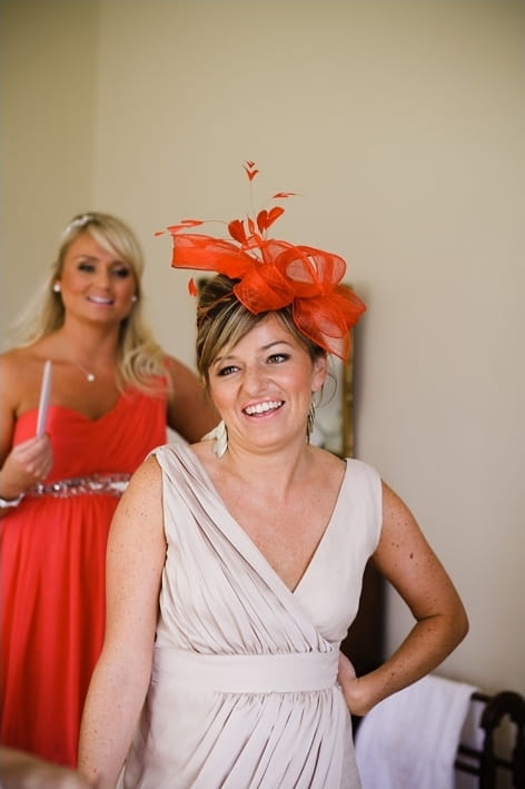 Wedding guest with orange headpiece - A Beautiful Garden Party Wedding at Lains Barn