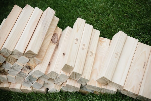 Jenga sticks - A Beautiful Garden Party Wedding at Lains Barn