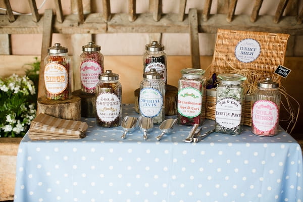 Jars of vintage sweets - A Beautiful Garden Party Wedding at Lains Barn