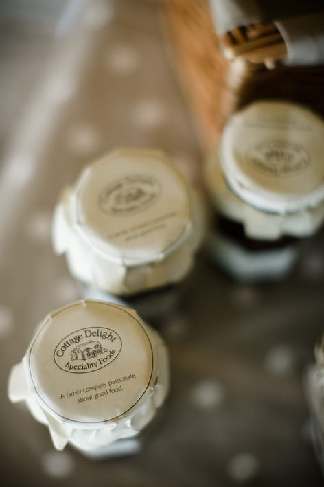 Chutney jars - A Beautiful Garden Party Wedding at Lains Barn