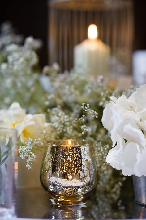 Silver candle holder on wedding breakfast table - A Beautiful Garden Party Wedding at Lains Barn